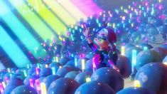 an animated character standing in front of many blue balls with colored lights on the sides