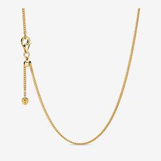 No jewellery collection is complete without a simple versatile necklace that can be worn by itself or accessorised with your favourite pendants. Our Curb Chain Necklace, crafted from a 14k gold-plated unique metal blend, is one of the most essential pieces for any wardrobe. It features a sliding clasp, flat interlocking chain links and a dangling curb chain. Wear the slider necklace on its own or layer it for a fashion-forward look. Adjust the sliding clasp to your preferred length. Available in-store and online. - Pandora Curb Chain Necklace - No Other Material / 14k Gold-plated unique metal blend - Sz. 60 cm Cheap Gold-tone Necklace With Adjustable Chain, Formal Gold-plated Necklace With Paperclip Chain, Minimalist Yellow Gold-plated Snake Chain Necklace, Gold-plated Crescent Necklace With Adjustable Chain, Rose Gold Paperclip Chain Necklace, Gold Plated, Simple Chain Necklace, Slider Necklace, Chain Links, Pandora Jewelry