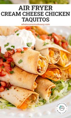 an air fryer cream cheese chicken taquitos on a white plate