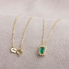 "Emerald, which is considered to be the stone of love, sensitivity and loyalty, is seen as a symbol of harmony in relationships. The green color of the emerald symbolizes luck, youth and rebirth. Our Rectangle Emerald necklace surrounded by 14K Solid Gold diamonds is an elegant jewel for you and your loved ones with its elegant design. Time to pamper yourself and your loved ones... Emerald is the birthstone of May. You can find our matching ring with our necklace here https://queenjewelryturkey. Gold Emerald Necklace, Emerald Style, Matching Ring, Emerald Necklace, May Birthstone, Minimalist Necklace, Birthstone Necklace, Stone Necklace, Mother Day Gifts