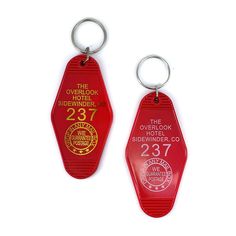 two red key tags with the words, the overlook hotel