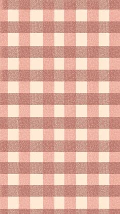 a pink and white checkered table cloth