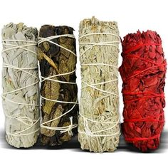 four different types of dried herbs tied together