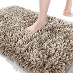 a person standing on top of a shaggy rug