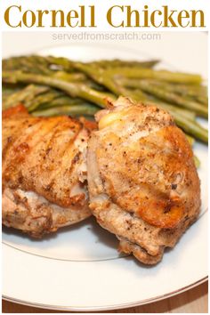 grilled chicken and asparagus on a white plate with the words cornel chicken served over it