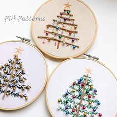 three embroidered christmas tree hoop art pieces on white background with text overlay that reads pff patterns