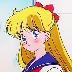 an anime character with blonde hair and blue eyes