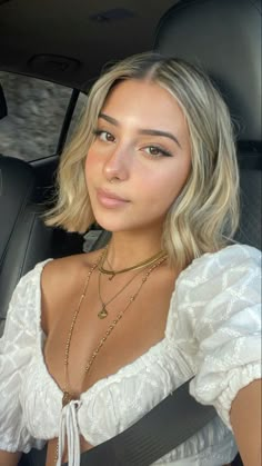 Olive Toned Skin Blonde Hair, Short Blonde Hair On Brunettes, Short Blonde Hair On Tan Skin, Short Blonde Hair Olive Skin, Blonde Hair On Neutral Skin, Blond Dyed Hair Short, Blonde Hair Color Ideas For Tan Skin, Short Blonde Hair Glasses, Brown Eyed Blonde Hair