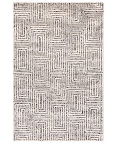 a white rug with grey squares on it