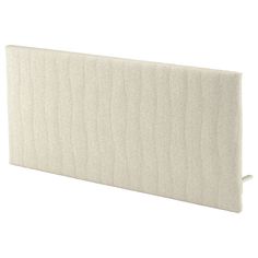 an image of a white headboard with no sheets on the top and bottom part