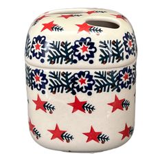 a ceramic container with red, white and blue snowflakes on it