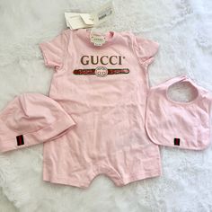 Part Of A Three-Piece Set, The Short-Sleeve Onesie Comes With A Coordinating Hat And Bib Finished With The House Web Stripe. Pale Pink Cotton Jersey Short Sleeve Sleepsuit With Gucci Vintage Logo, Buttons Along One Shoulder Seam And Snaps At The Inseam Hat With Green And Red Web Detail Bib With Green And Red Web Detail And Adjustable Snap Button Closure Made In Italy 100% Cotton Brand New. Never Worn. Tags Still Attached. Baby Size 9/12 Months. Versace Baby Clothes, Gucci Baby Clothes, Old Baby Clothes, Luxury Baby Clothes, Luxury Baby Gifts, Gucci Baby, Web Detail, Red Web