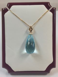 "SOLID 14KT YELLOW GOLD PENDANT NATURAL BLUE TOPAZ IS  20x10 PEAR SHAPE NATURAL DIAMOND IS 0.01 TCW PENDANT IS 1. 1/8\" INCHES ( INCLUDING BAIL ) 925 STERLING SILVER GOLD PLATED CHAIN IS 18\" INCHES (FREE) WITH GIFT BOX" Pear-shaped Blue Topaz Yellow Gold Jewelry, Blue Topaz Pendant Necklace, November Birthstone Necklace, Blue Topaz Necklace, Turquoise Earrings Dangle, Blue Topaz Pendant, Topaz Pendant, Topaz Necklace, Flower Pendant Necklace