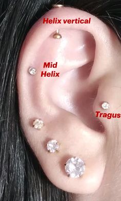 three different types of piercings in the ear