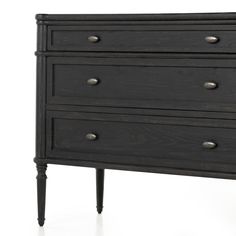 a black dresser with three drawers and two legs on it's side, against a white background