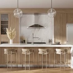 a modern kitchen with marble counter tops and wooden cabinets is pictured in this image, there are four stools at the center of the island