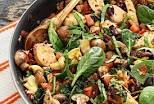 a pan filled with food sitting on top of a table