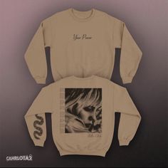 a white sweatshirt with an image of a woman's face and words on it