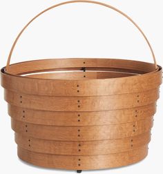 a wooden bucket with holes on the side and handle is shown in front of a white background