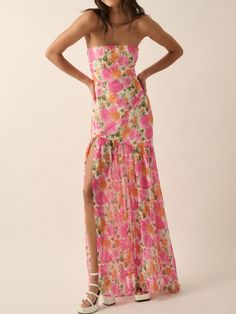 Details: PRE ORDER 5/28 Strapless asymmetrical dress Floral Straight neckline Side slit Size + Fit: Model is 5'4 Wearing size small   Fabric + Care: 100% polyester Shipping + Return: Free US ground shipping on orders $100+ We offer free returns and a refund in the form of store credit with items not worn within 10 days Floral Print Chiffon Maxi Dress, Asymmetrical Maxi Dress, Garden Dress, Maxi Dress Pattern, Floral Print Chiffon, Strapless Maxi, Straight Neckline, Strapless Maxi Dress, Pink Maxi Dress