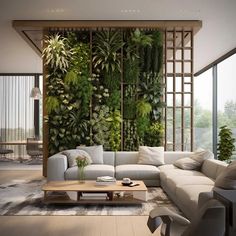 a living room with plants on the wall and couches in front of it's windows