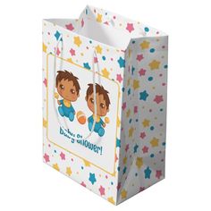 a paper bag with two cartoon characters on the front and bottom, sitting against a white background