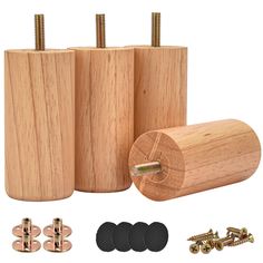 three wooden cylinders with screws and nuts