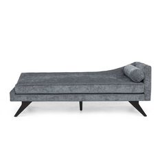 a gray chaise lounger with two pillows on it's back and legs