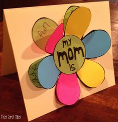 mother's day card with a flower made out of paper and the words, mom is