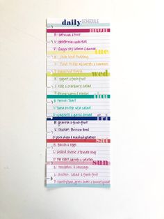 a piece of paper with writing on it that says daily schedule written in different colors