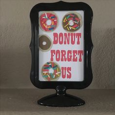 a sign with donuts on it that says, donut forgets forgt us