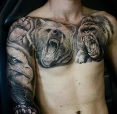 a man's chest with two bears and an eagle tattoo on his left side