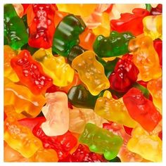 many different colored gummy bears are arranged together