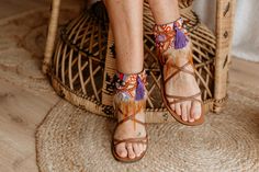 Elevate your summer footwear with our Stunning Purple and Orange Feather Fringe Sandal Ankle Ties. These flat shoe accessories feature decorative laces and leather sandal ankle wraps adorned with vibrant feather fringe. Perfect for adding a bohemian flair to your ensemble, they blend artisan craftsmanship with bold summer hues, making every step a statement of unique style and free-spirited elegance. * This ad is for a pair of anklets; footwear is not included. * If you need a custom design or f Feather Fringe, Summer Footwear, Fringe Sandals, Flat Shoe, Purple And Orange, Summer Flats, Free Spirited, Summer Shoes, Women's Shoes Sandals