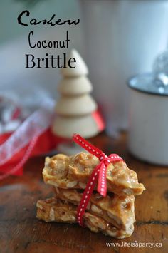 some pieces of food are stacked on top of each other and tied with a red ribbon