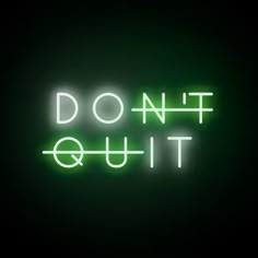 a neon sign that says don't quit