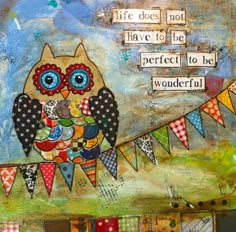 an owl sitting on top of a wooden table next to a sign that says life does not have to be perfect to be wonderful