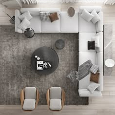 an overhead view of a living room with couches and chairs