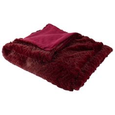 a red blanket is laying on top of a white background