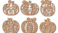 wooden cutouts with pumpkins and scrolls on them, set of 8 pieces for laser cutting