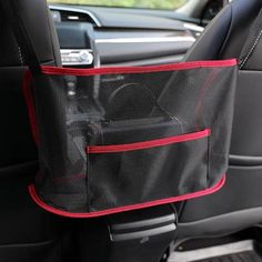 the back seat pocket is attached to the car's front passenger side console and holds an electronic device