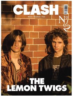 two young men standing in front of a brick wall on the cover of clash magazine