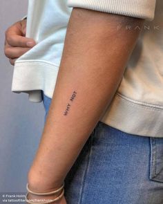 a woman's arm with the word love written on it, and her name in cursive font