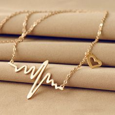 Nwt. Gold Plated Heart Beat Necklace. Hp Best In Boutiques Party Heartbeat Necklace, Logam Mulia, Wave Necklace, Choker Pendant, Heart Shaped Necklace, Charm Necklace Silver, Trendy Necklaces, Charm Pendant Necklace, 로고 디자인