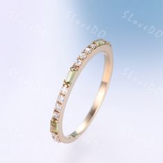 You are looking at a baguette shaped green peridot and diamond wedding ring, natural peridot and natural diamond wedding ring. Stone: *1.5mmx3mm baguette natural green peridot. *0.15 Natural Real Diamonds. SI Clarity and H Color. Metal *925 sterling silver,the side stones are CZ * Solid 10k 14k &18k. *Color:white gold,yellow gold,rose gold. Custom Order *The main stone can be other gemstones you can imagine,any birthstone can be made.Please contact me if you need this service. *Any size *I can a Yellow Gold Stacking Rings, Mother's Ring, August Birthstone Ring, Green Gemstone Ring, Future Engagement Rings, Mother Rings, August Birthstone, Gold Ring Stack, Ring Stone