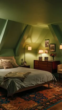 a large bed sitting in the middle of a bedroom next to two lamps on either side of it