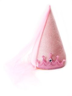 a pink hat with a tiara on it