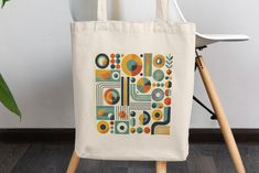 Elevate your style with this stunning midcentury modern shoulder bag! 🌟✨ Featuring a bold and colorful geometric design, this retro 70's inspired tote is perfect for the chic, boho-loving girlfriend in your life. Its unique pattern makes it a standout piece, ideal for carrying your favorite books or essentials while adding a touch of vintage charm to your outfit. Whether you're heading to the market, a casual outing, or a summer adventure, this shoulder bag combines practicality with eye-catchi Retro Square Shoulder Bag For Everyday, Retro Everyday Rectangular Shoulder Bag, Retro Rectangular Shoulder Bag For Everyday, Retro Crochet Shoulder Bag, Square Retro Shoulder Bag, Retro Everyday Shoulder Bag, Retro Flap Shoulder Bag, Retro Shoulder Bag For Everyday Use, Mid-century Rectangular Shoulder Bag For Daily Use