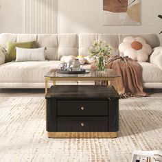 a living room with a couch, coffee table and other items on the floor in front of it