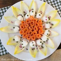 a white plate topped with food on top of a table